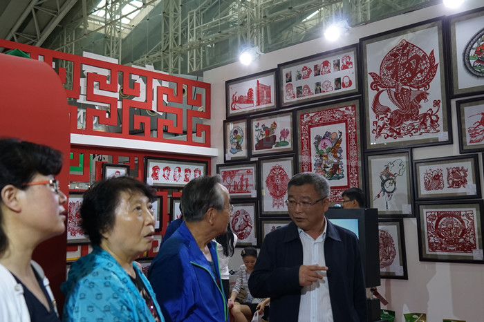 我局文化产品亮相中俄文化博览会暨北大荒文化产品展示交流会(图3)