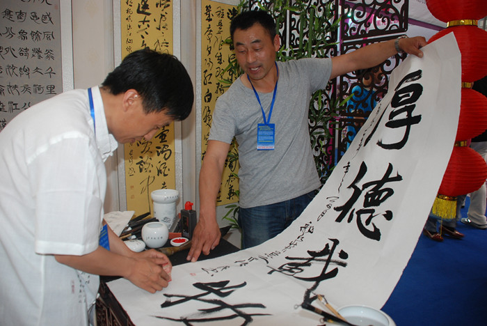 大西江农场书法文化"出彩"文博会(图1)
