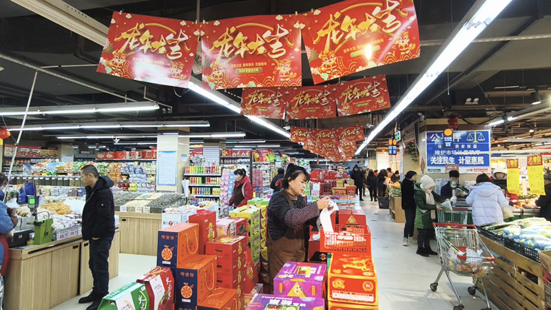 前进农场有限公司年货大集年味足 “烟火气”里迎新春(图2)
