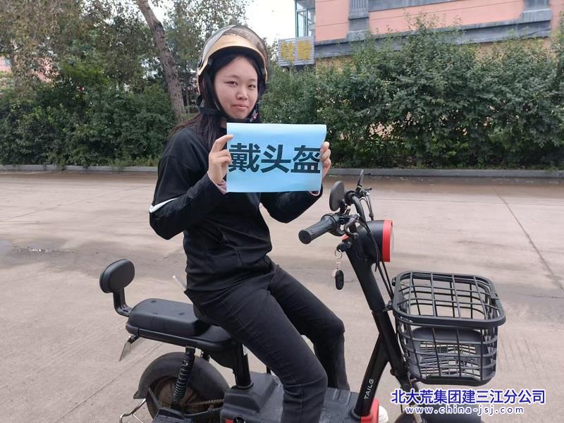 欣园社区开展“一盔一带”宣传工作(图3)